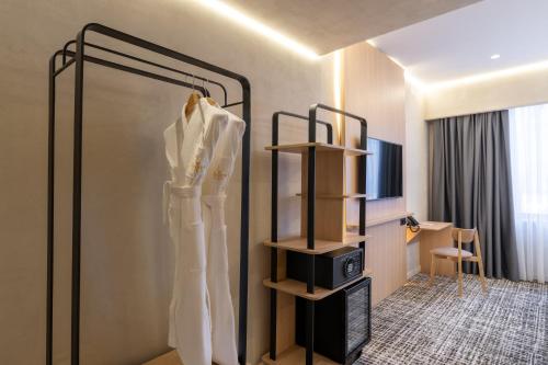 Imagen de la habitación del Hotel Renion City. Foto 19