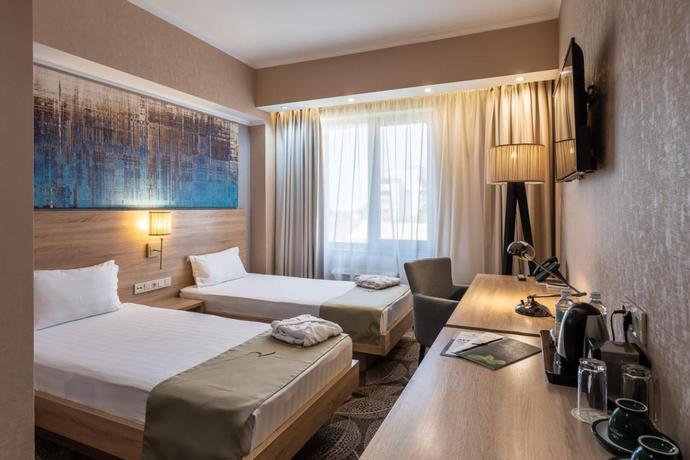 Imagen de la habitación del Hotel Renion Park. Foto 7