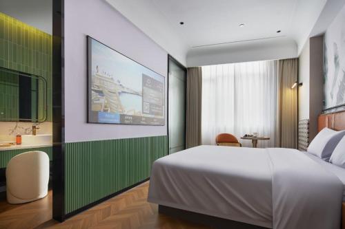 Imagen de la habitación del Hotel Renjoy -Xiamen Zhongshan Road Pedestrian Street. Foto 17