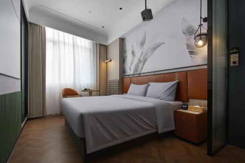 Imagen de la habitación del Hotel Renjoy -Xiamen Zhongshan Road Pedestrian Street. Foto 18