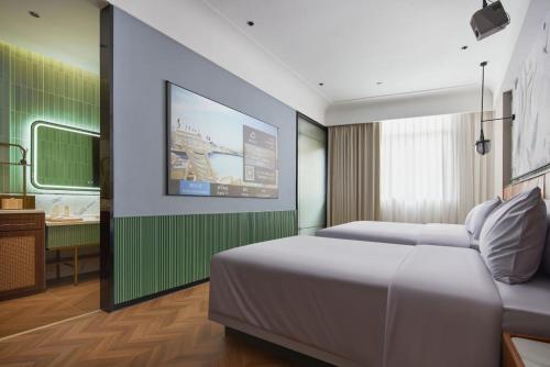 Imagen de la habitación del Hotel Renjoy -Xiamen Zhongshan Road Pedestrian Street. Foto 19