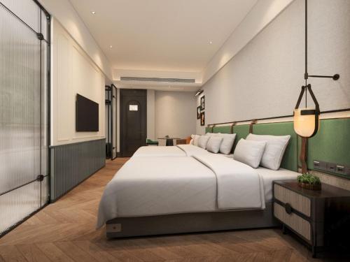 Imagen de la habitación del Hotel Renjoy -Xiamen Zhongshan Road Pedestrian Street. Foto 20