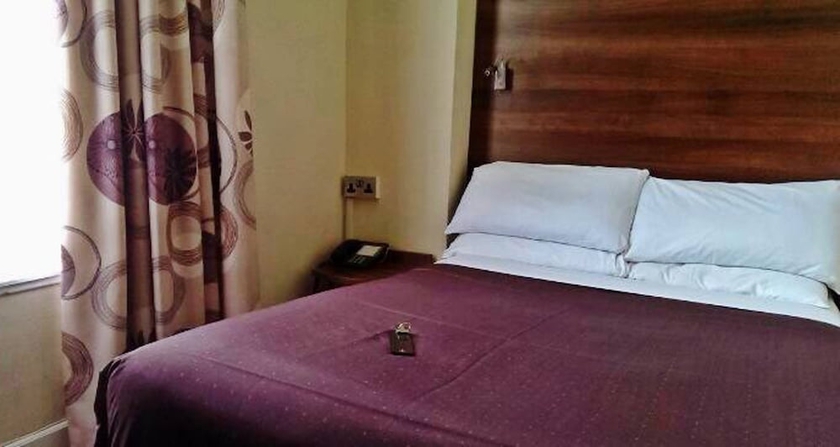 Imagen de la habitación del Hotel Rennie Mackintosh Art School. Foto 11