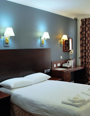 Imagen de la habitación del Hotel Rennie Mackintosh Station. Foto 13