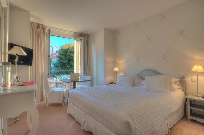 Imagen de la habitación del Hotel Renoir, Cannes. Foto 11