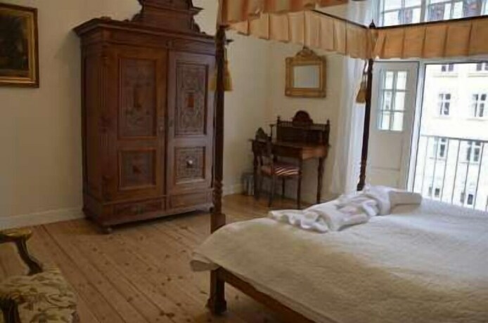 Imagen de la habitación del Hotel Rent A Room Copenhagen. Foto 22