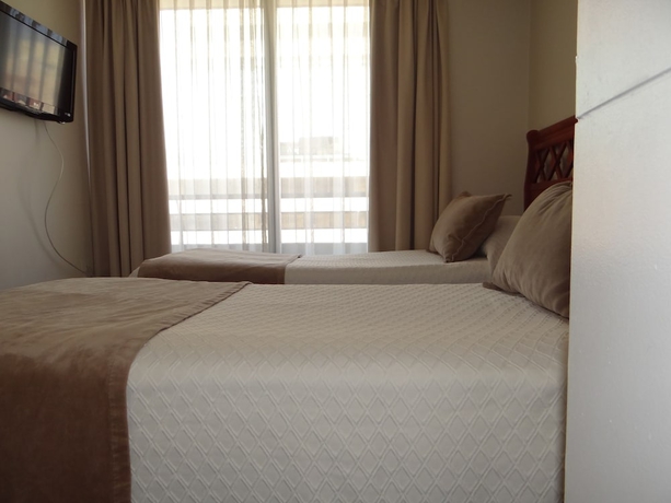Imagen de la habitación del Hotel Rentasuite. Foto 3