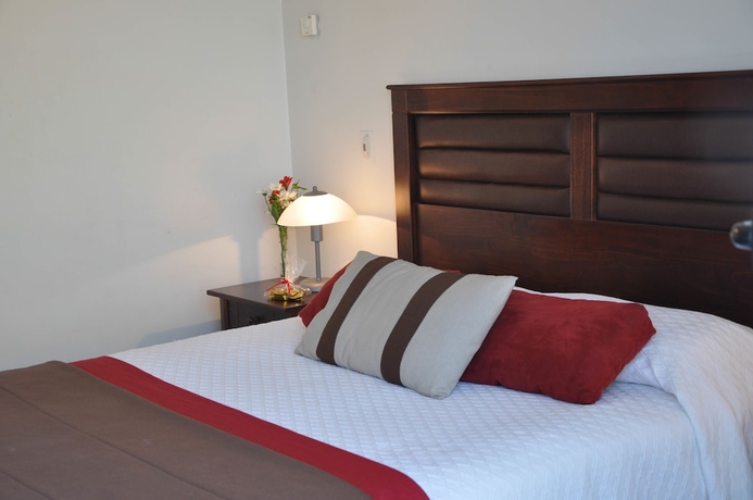 Imagen de la habitación del Hotel Rentasuite. Foto 13