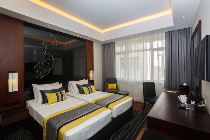 Imagen de la habitación del Hotel Renuka City. Foto 2