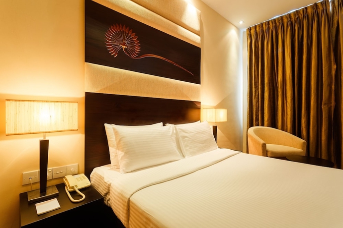 Imagen de la habitación del Hotel Renuka City. Foto 10