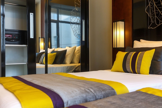 Imagen de la habitación del Hotel Renuka City. Foto 16