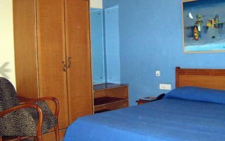 Imagen de la habitación del Hotel Renzo's Inn. Foto 4