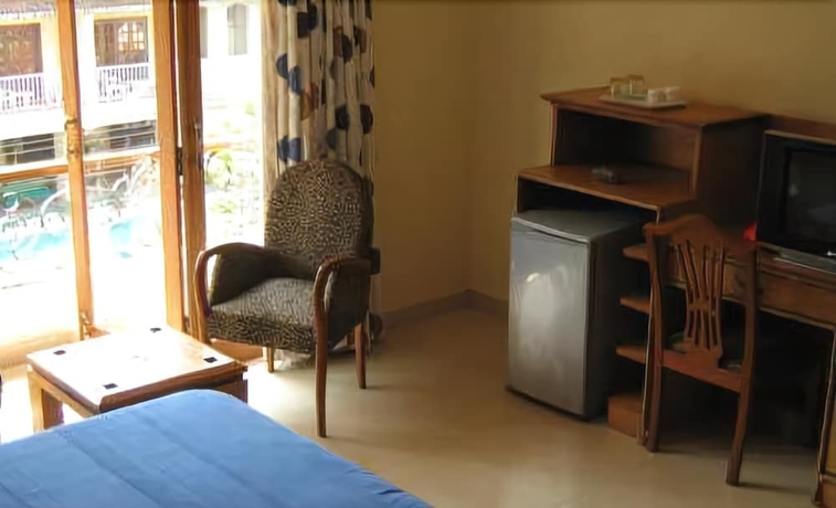 Imagen de la habitación del Hotel Renzo's Inn. Foto 10