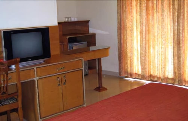 Imagen de la habitación del Hotel Renzo's Inn. Foto 11