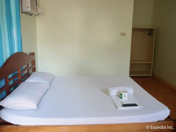 Imagen de la habitación del Hotel Replica Manor. Foto 19