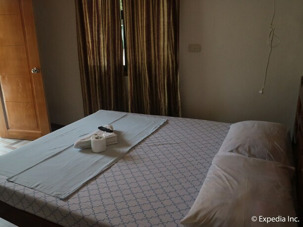 Imagen de la habitación del Hotel Replica Manor. Foto 20