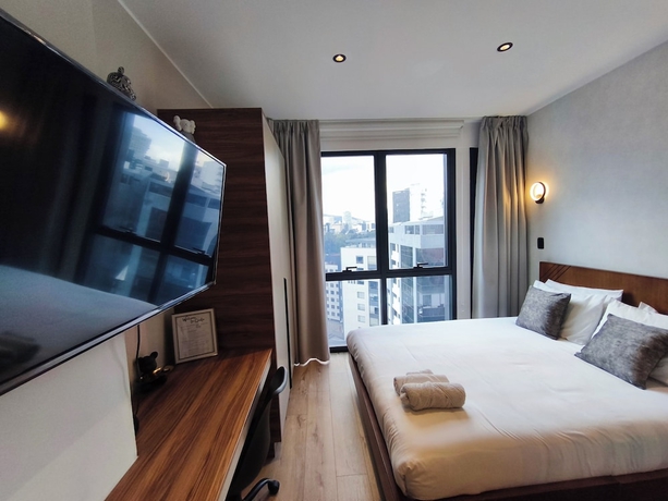 Imagen de la habitación del Hotel Republica del Salvador Coliving Ecuador. Foto 11