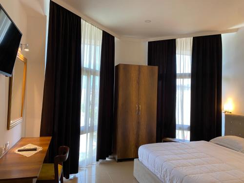 Imagen de la habitación del Hotel Republika Berat. Foto 2