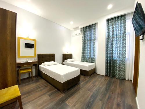 Imagen de la habitación del Hotel Republika Berat. Foto 7