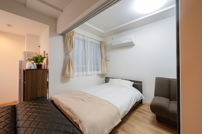 Imagen de la habitación del Hotel RepureOmori. Foto 2