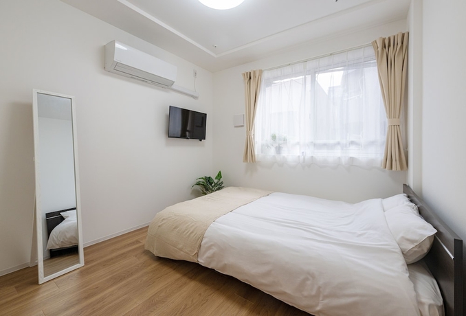 Imagen de la habitación del Hotel RepureOmori. Foto 4