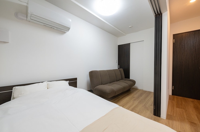Imagen de la habitación del Hotel RepureOmori. Foto 7