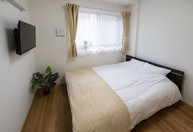 Imagen de la habitación del Hotel RepureOmori. Foto 8