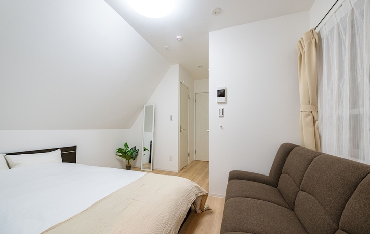 Imagen de la habitación del Hotel RepureOmori. Foto 13
