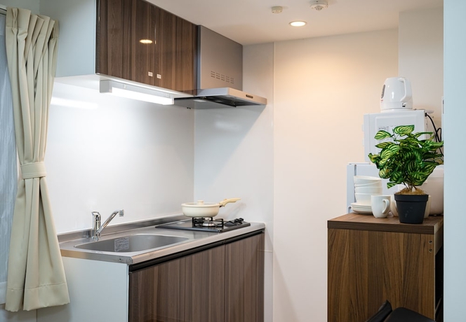 Imagen de la habitación del Hotel RepureOmori. Foto 18