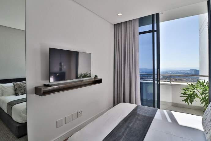 Imagen de la habitación del Hotel Reserved Suites Illovo. Foto 20