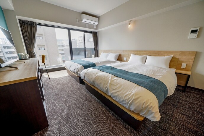 Imagen de la habitación del Hotel Resi Stay Heart. Foto 16