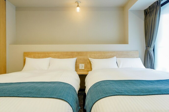 Imagen de la habitación del Hotel Resi Stay Heart. Foto 17