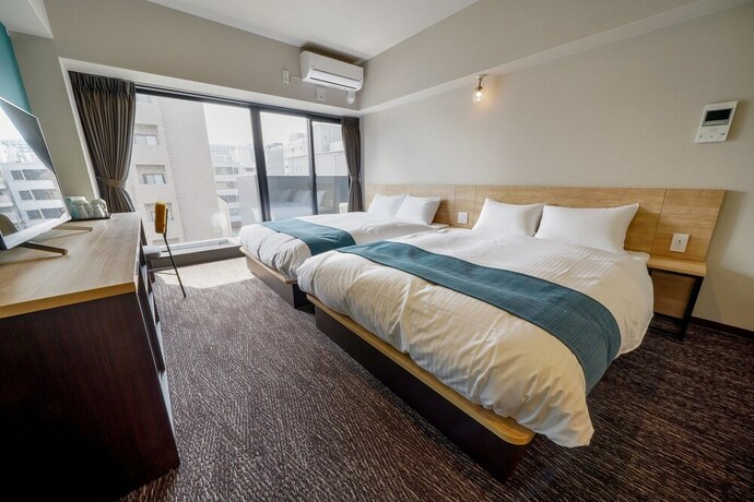 Imagen de la habitación del Hotel Resi Stay Heart. Foto 20
