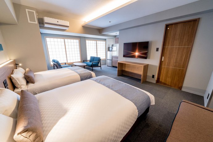 Imagen de la habitación del Hotel Resi Stay Sun Chlorella. Foto 5