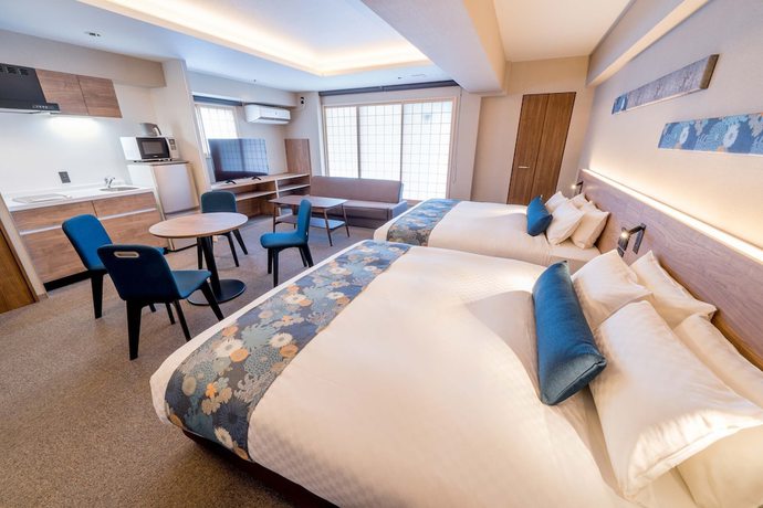 Imagen de la habitación del Hotel Resi Stay Sun Chlorella. Foto 11