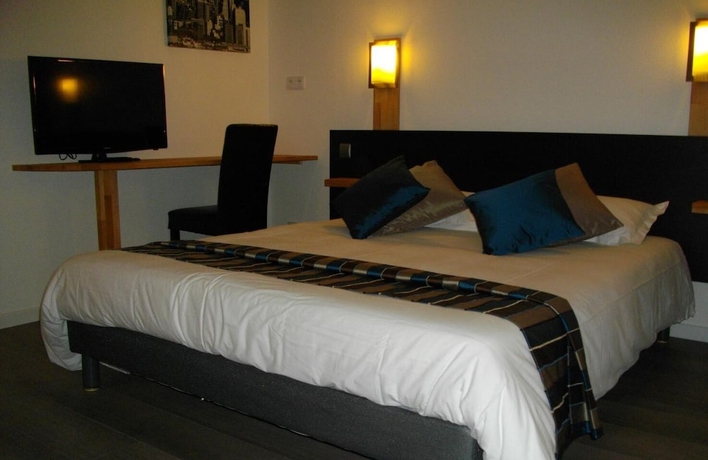 Imagen de la habitación del Hotel Residella House. Foto 17