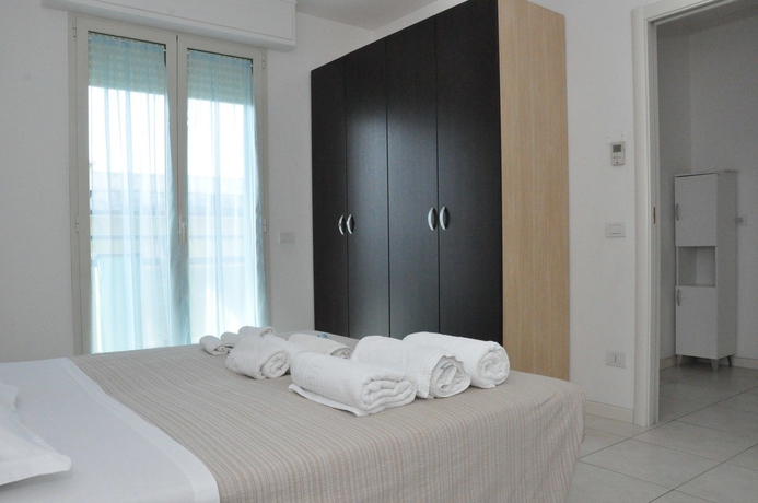 Imagen de la habitación del Hotel Residence Acqua Suite Marina. Foto 13