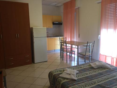 Imagen de la habitación del Hotel Residence Adriatico, Rimini. Foto 3