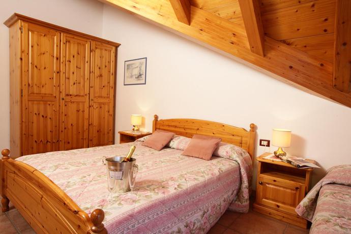 Imagen de la habitación del Hotel Residence Al Caminetto. Foto 4