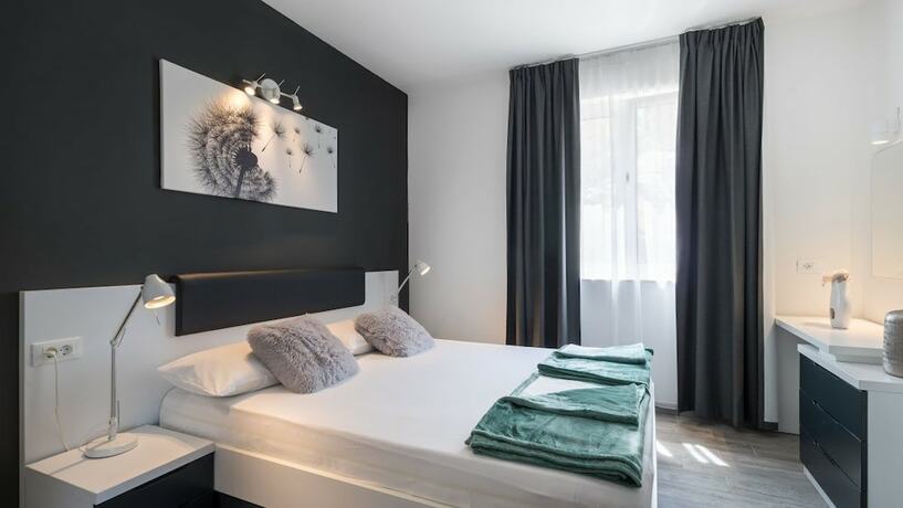 Imagen de la habitación del Hotel Residence Alpha. Foto 11