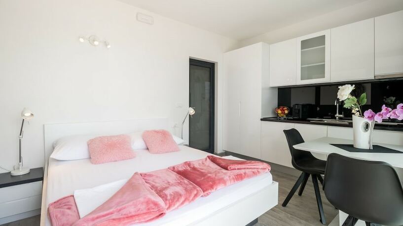 Imagen de la habitación del Hotel Residence Alpha. Foto 13