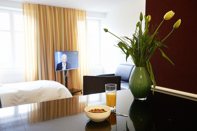 Imagen de la habitación del Hotel Residence Apartments by Hotel du Commerce. Foto 6