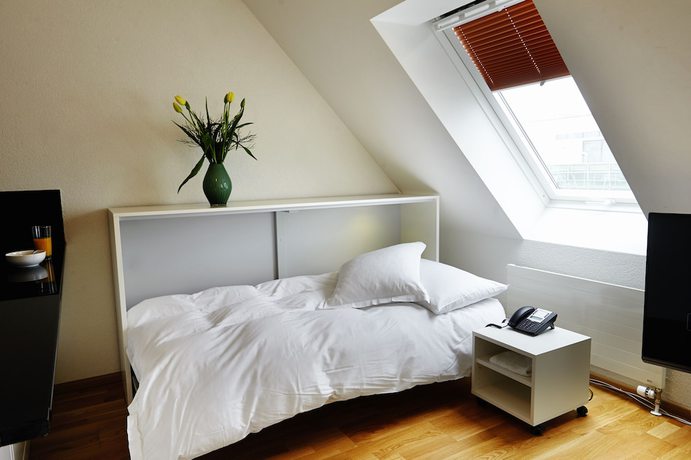 Imagen de la habitación del Hotel Residence Apartments by Hotel du Commerce. Foto 10