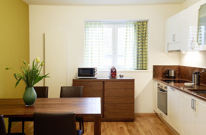 Imagen de la habitación del Hotel Residence Apartments by Hotel du Commerce. Foto 11