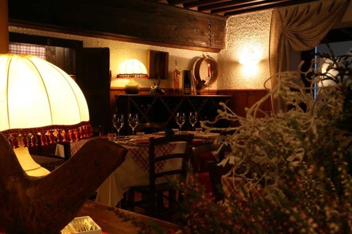 Imagen del bar/restaurante del Hotel Residence Au Vieux Grenier. Foto 5