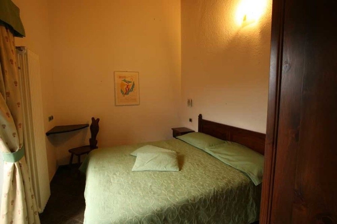 Imagen de la habitación del Hotel Residence Au Vieux Grenier. Foto 8