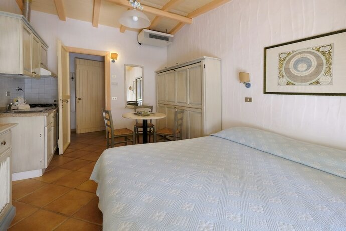 Imagen de la habitación del Hotel Residence Baia Caddinas. Foto 16