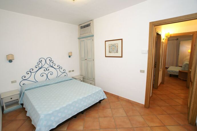 Imagen de la habitación del Hotel Residence Baia Caddinas. Foto 18