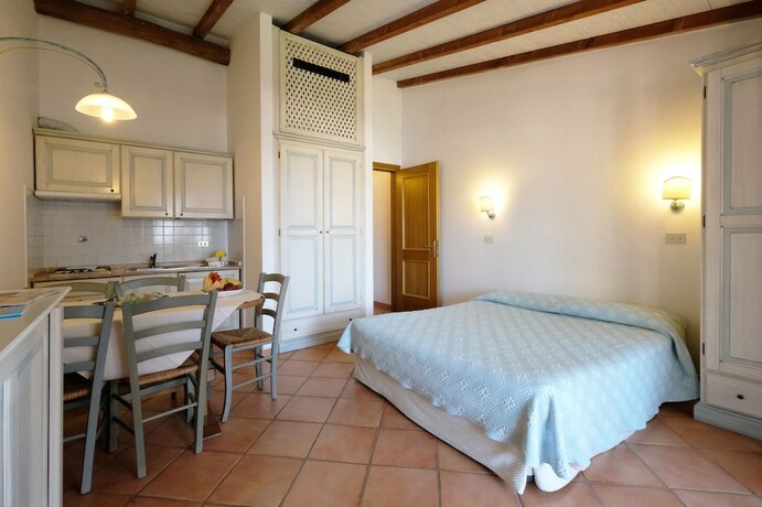 Imagen de la habitación del Hotel Residence Baia Caddinas. Foto 20