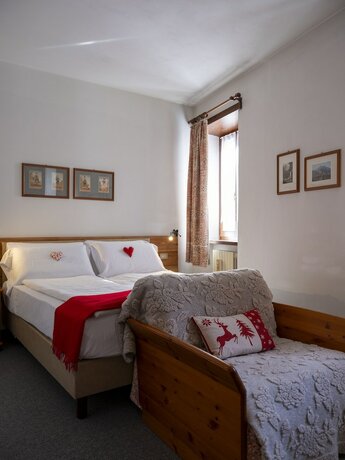 Imagen de la habitación del Hotel Residence Cima Jazzi. Foto 18